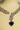 Panache Y-drop necklace set with heart-cut pendant and crystal accents, available in emerald, sapphire, or maroon with matching earrings.