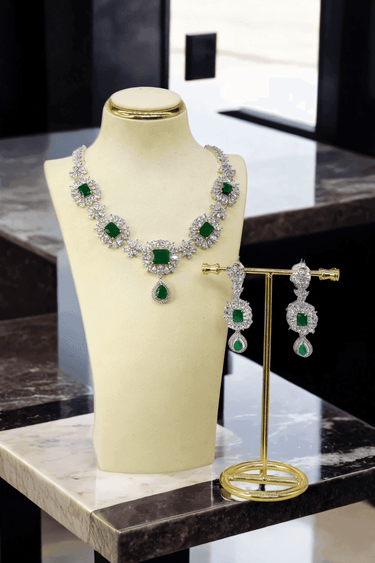 Abi Diamante Floral Necklace Set - AD CZ Necklace Set with intricate floral design, featuring a stunning aqua blue teardrop center stone, perfect for any occasion.