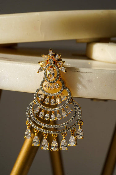 Detailed view of gold Mim chandbali earring with AD stones and floral motif, ideal for stylish dangle earring lovers.
