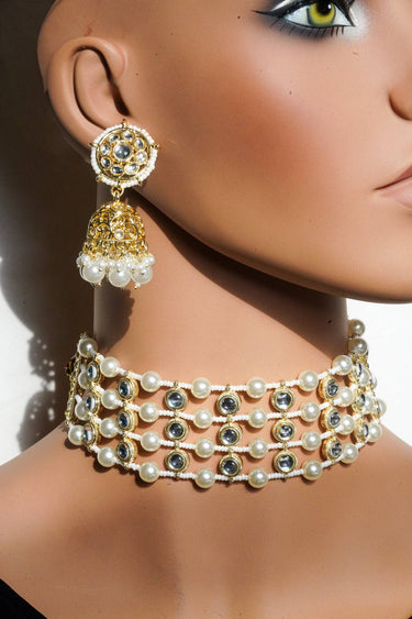 Close-up of Inaury Manisha Pearl Choker Necklace Set on necklace bust.