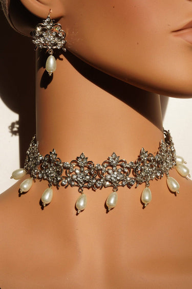 Close-up of Rubina Filigree Choker Necklace Set with earrings on mannequin