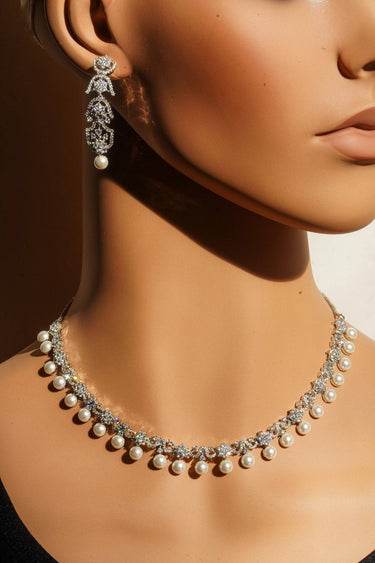 Aditi Flora Pearl & Diamante Necklace Set displayed on mannequin