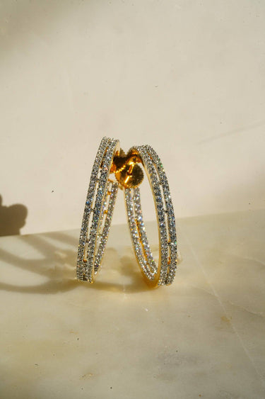 Nina AD Hoop Earrings showcasing elegant gold and diamond detailing