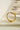 Chic gold earrings showcasing intricate marquise and AD design