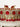 Detailed view of Sweta Diamante Choker Necklace with red stones, kundan accents, and layered gold craftsmanship.