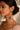 Gina Diamante Long Hoop Jhumka Earrings worn by model