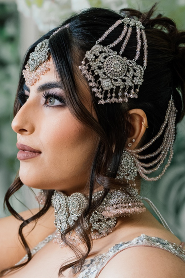 Namar Silver Plated AD Indian Choker Necklace Set worn by model, featuring white CZ stones and light pink beads in a bridal look.
