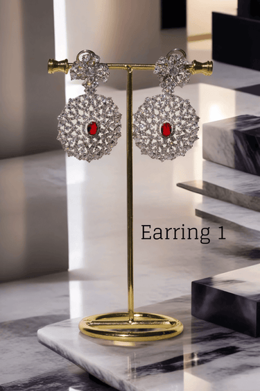 Priya Diamante Bridal Set - Rhodium-plated silver with maroon accents, including cascading necklace and intricate floral choker with matching earrings.
