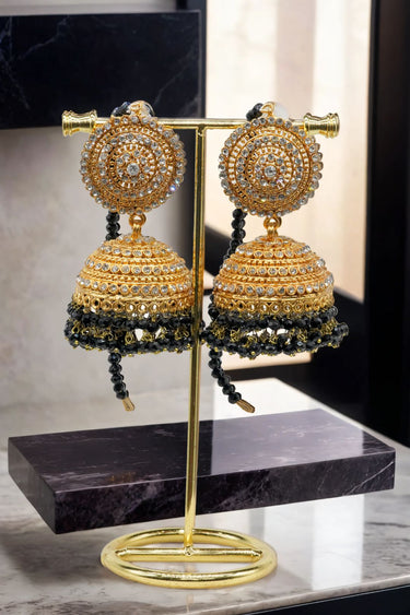 Gold Tabiha Jhumka Earrings with black bead accents, a bold addition to the traditional Pakistani jewelry set.