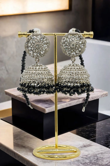 Tabiha Pakistani Jhumka & Tikka Set in silver with black bead accents, ideal for festive and wedding jewelry collections.