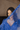 Model in blue lehenga with Purvi Diamante Necklace Set - Bridal Indian Jewelry, partially veiled for a dramatic bridal portrait.