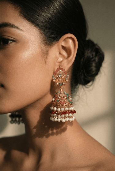 Juhi matte gold plated multicolor jhumka earrings with zircon stones