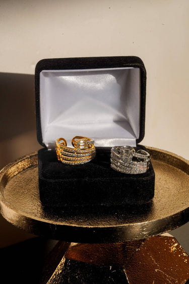 Inaury Nina multirow adjustable AD ring in gold and rhodium plating with white diamante stones displayed on black velvet gift box – South Asian jewelry
