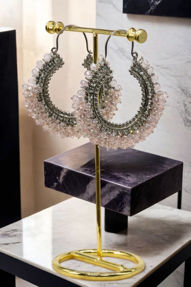 Noor Chandbali Hoop Earrings in silver-tone with soft pink beads, exuding delicate South Asian-inspired sophistication.