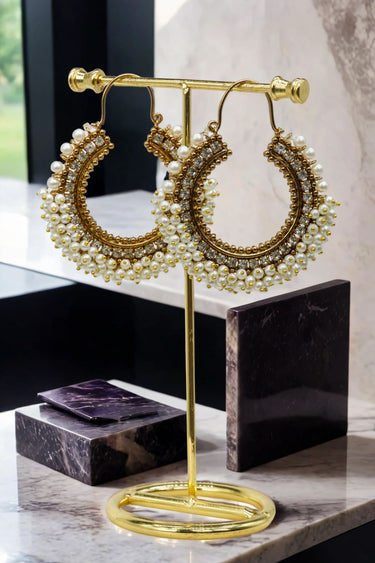 Noor Chandbali Hoop Earrings in gold-tone with white pearls, blending traditional South Asian charm with modern style.