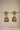 Back view of the earrings showing the gold filigree design and secure screw back for comfortable wear