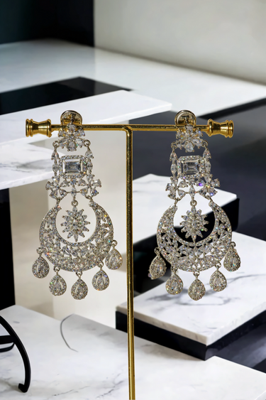 Samina chandelier earrings, rhodium-plated, white pavé stones, crescent design with teardrop charms, Indian jewelry