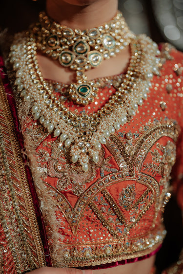 Afsoon bridal set featuring moissanite polki stones with choker, earrings, and jhoomer from Inaury.com