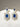 Amisha Triple Layer Diamante Accent AD Necklace Set in gold or rhodium-plated silver finish with color options of silver & sapphire blue, silver & green, gold & green, and silver & ruby, featuring floral and cushion cut stone patterns with matching earrings.