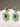 Amisha Triple Layer Diamante Accent AD Necklace Set in gold or rhodium-plated silver finish with color options of silver & sapphire blue, silver & green, gold & green, and silver & ruby, featuring floral and cushion cut stone patterns with matching earrings.