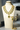 Amisha Triple Layer Diamante Accent AD Necklace Set in gold or rhodium-plated silver finish with color options of silver & sapphire blue, silver & green, gold & green, and silver & ruby, featuring floral and cushion cut stone patterns with matching earrings.