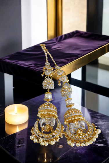 Gold-plated kundan jhumka earrings with sculpted bird motif and pearl danglings – Inaury.com