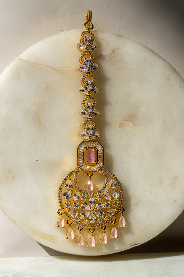 Gold-plated floral maang tikka with American Diamonds in white and pink from Inaury