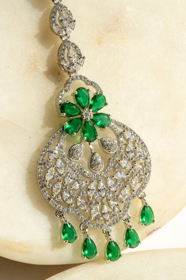 Silver-plated floral maang tikka with AD stones in silver and green from Inaury