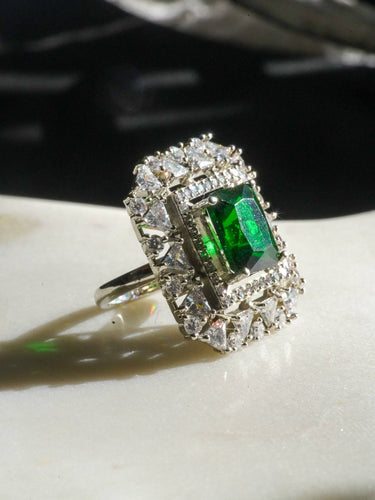 Ankita Rhodium-Plated Statement Ring with Emerald-Cut Gemstone and Halo Accents - Indian Jewelry