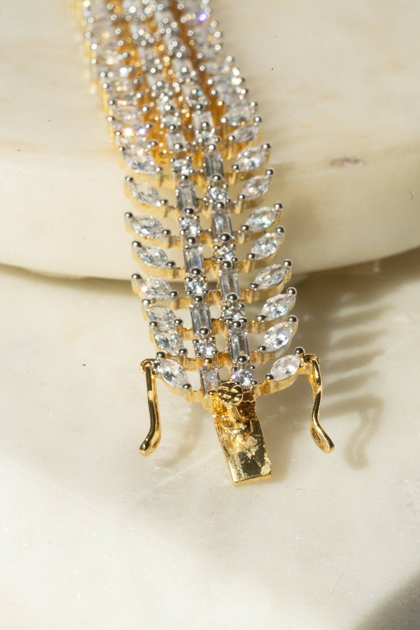 Ariana gold or rhodium plated AD stone bangle bracelet with diamante accents from Inaury