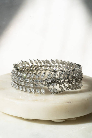 Ariana gold or rhodium plated AD stone bangle bracelet with diamante accents from Inaury