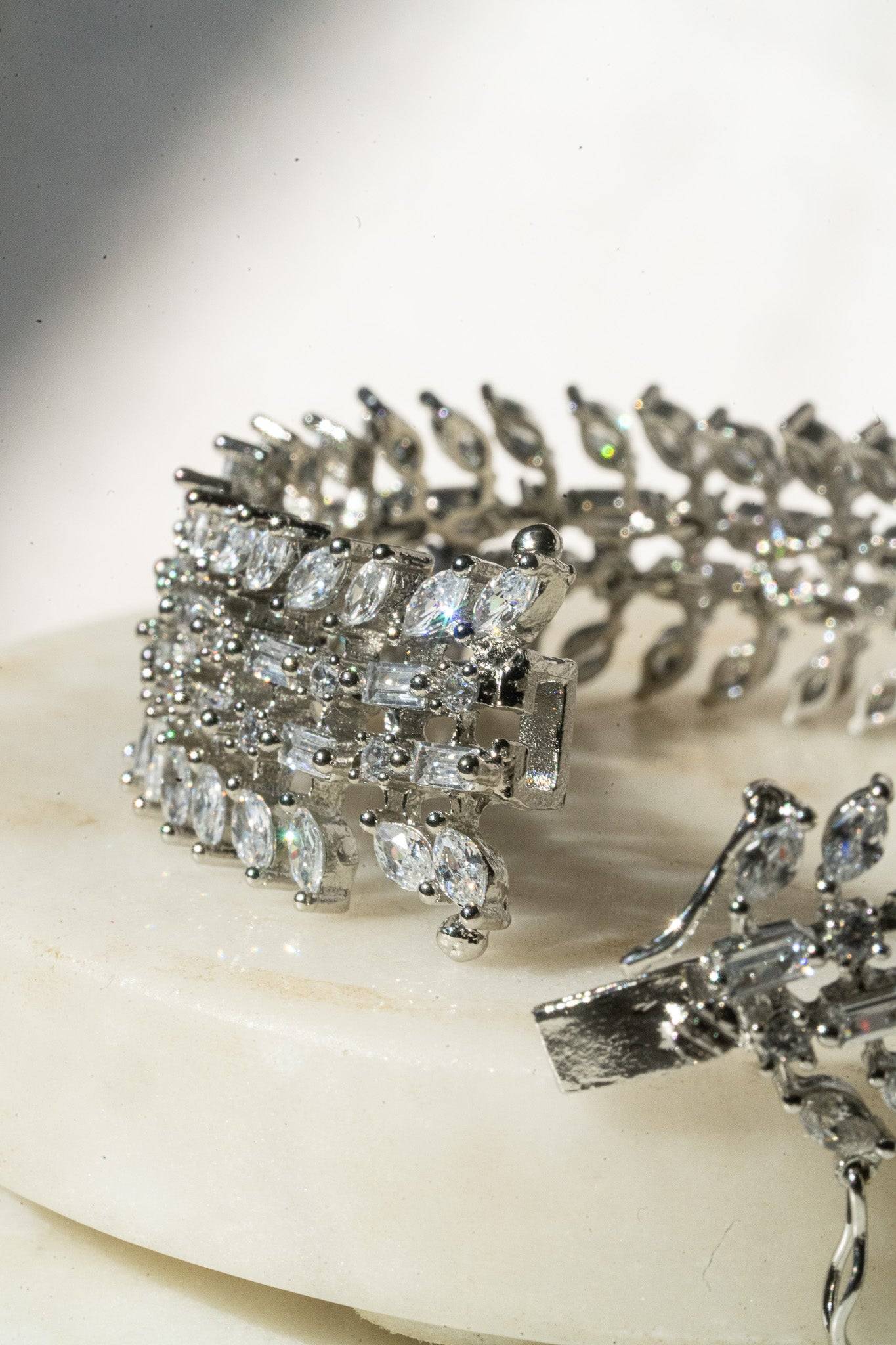 Ariana gold or rhodium plated AD stone bangle bracelet with diamante accents from Inaury