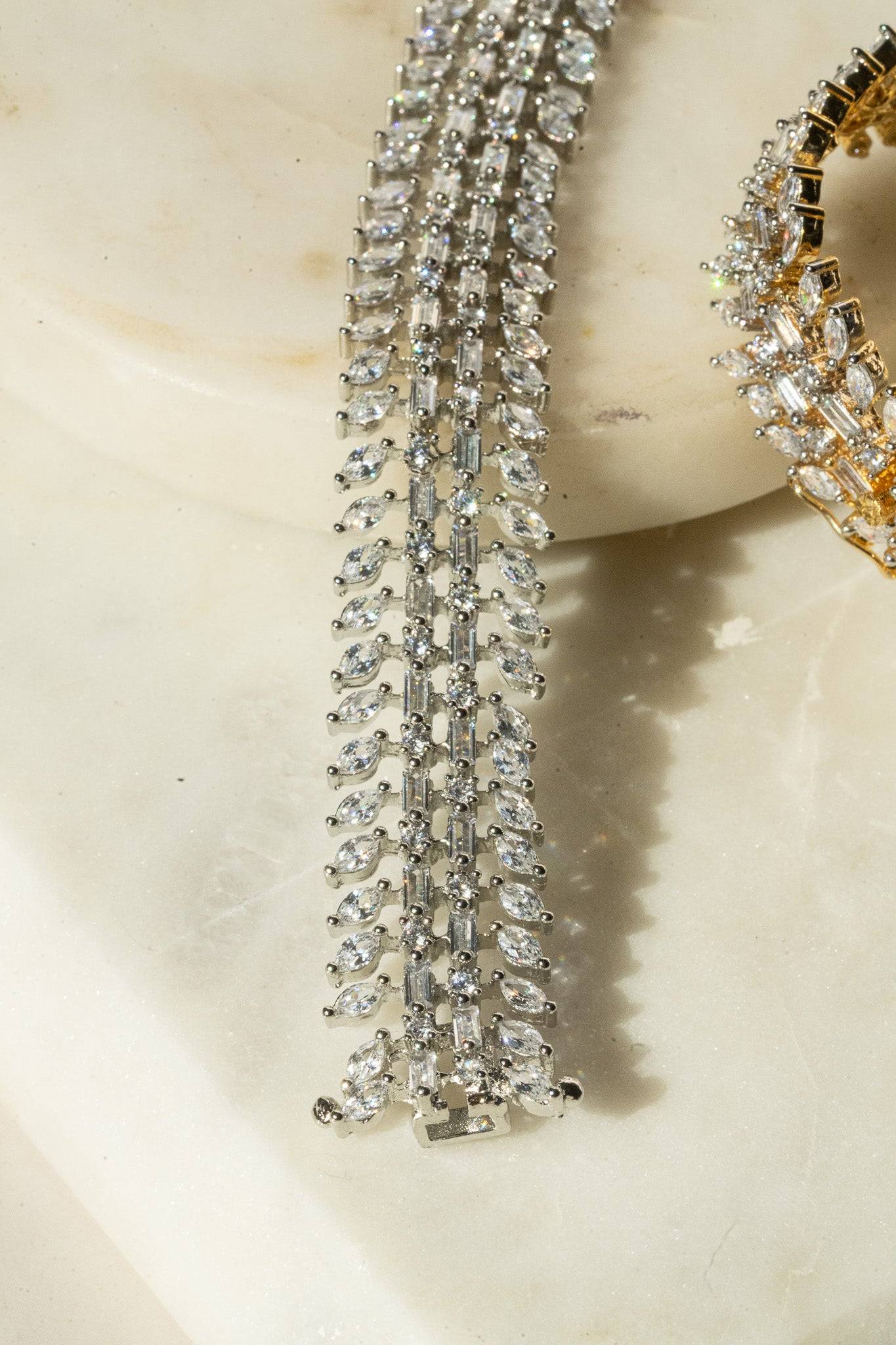 Ariana gold or rhodium plated AD stone bangle bracelet with diamante accents from Inaury