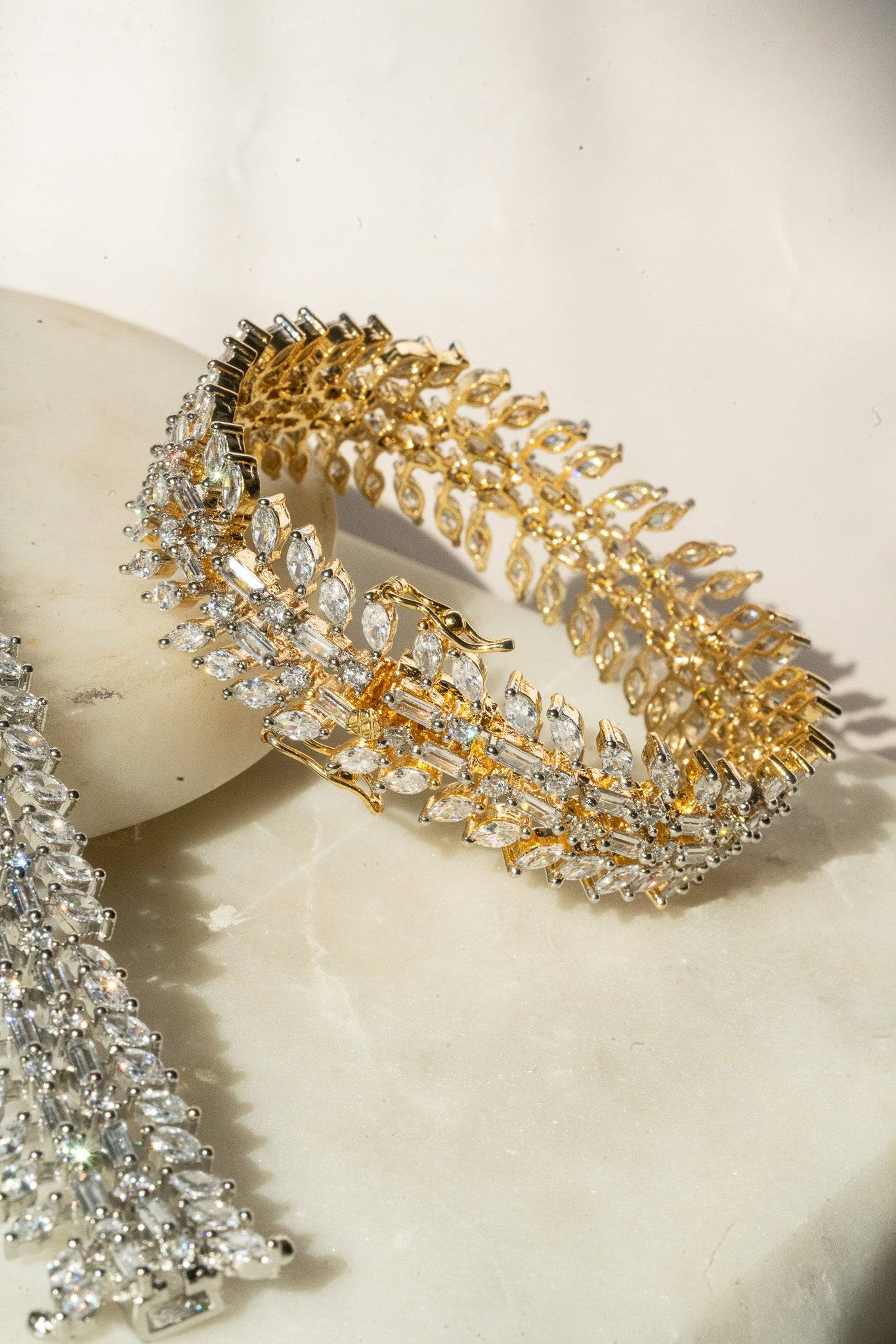 Ariana gold or rhodium plated AD stone bangle bracelet with diamante accents from Inaury