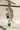 Rhodium plated vine design earrings with diamante stones and resin beads in green or maroon from Inaury