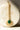 Gold-plated maang tikka with matte green teardrop center and white AD stones from Inaury