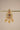 A close up studio catalog shot focusing on a single Aadhya Kundan drop earring hanging on a display bar to highlight the fine seed pearl trim.