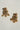 A flat lay e commerce catalog shot of the pair of gold plated Aadhya Kundan drop earrings displayed clearly on a white surface.