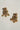 A flat lay e commerce catalog shot of the pair of gold plated Aadhya Kundan drop earrings displayed clearly on a white surface.