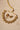 Ishani antique gold crescent choker and earrings laid flat, showing the adjustable gold dori drawstring
