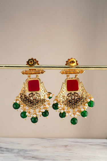 The reverse technical layout of the Kavya gold-plated statement earrings showcasing the smooth high-polish metal backing and secure push-back post structure.