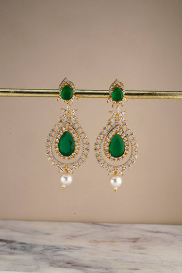 Avira AD Gold Plated Drop Earrings displayed on a stand