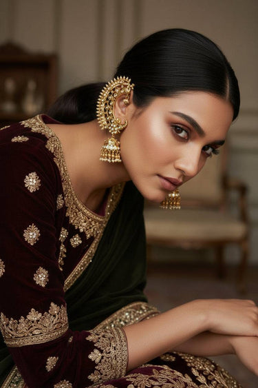 Model wearing Inaury Maharani Ear Cuffs with Jhumka Pearl White with updo hairstyle — gold-plated ear cuff jewelry for desi bridal and formal occasions