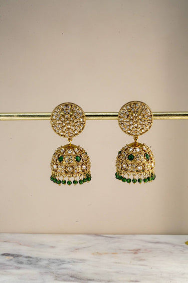 Front view of gold heritage jhumka earrings with floral diamond patterns, dangling pearl beads, and intricate craftsmanship for weddings