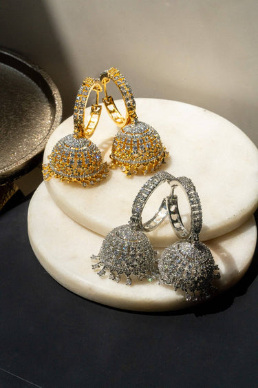Gold and rhodium plated Lailoma Jhumka Earrings on display