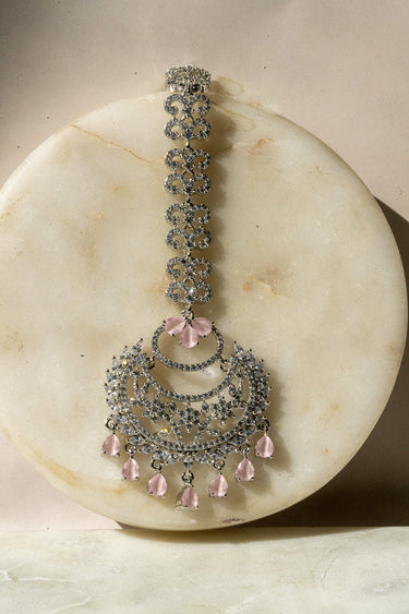 Liza Rhodium AD Maang Tikka in pink with sparkling AD stones and floral drop design, perfect for elegant ethnic wear.