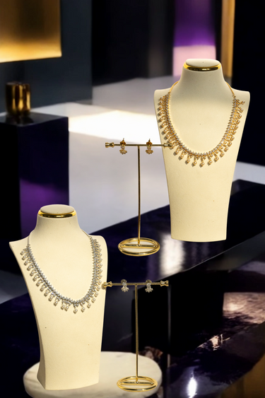Mila necklace set with pearl drops and diamanté stones in gold and rhodium plating from Inaury
