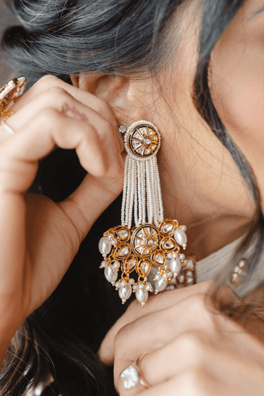 Mona Pearl Moissanite Polki Choker Set – Indian Jewelry featuring layered pearl strands, central floral moissanite polki motif, and gold accents.