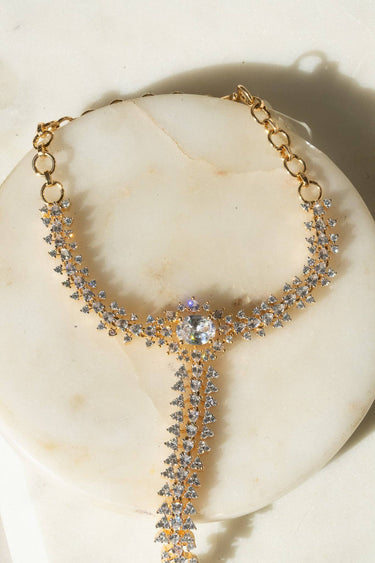 Nayla statement haathphool - hand chain bracelet in gold with ring