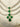 Niara Triple Layer Diamante Accent AD Necklace Set in gold or rhodium-plated silver finish with color options of silver & sapphire blue, silver & green, gold & green, and silver & ruby, featuring triple-layered chain links and matching statement earrings.